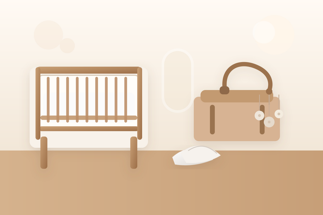 Wooden baby mobile and soft cleaning cloth beside a bare crib in a calm modern nursery with gentle daylight
